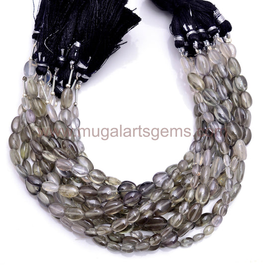 Natural Sillimanite Cats Eye Beads From India 4x.5.5 to 8x10.5mm Approx. 57.5 Ct Approx. 8 inch Oval Shape Black Color Smooth Beads.
