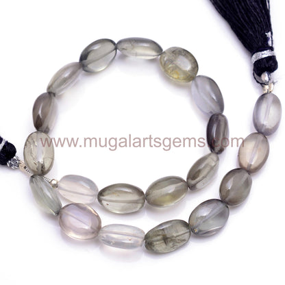 Natural Sillimanite Cats Eye Beads From India 4x.5.5 to 8x10.5mm Approx. 57.5 Ct Approx. 8 inch Oval Shape Black Color Smooth Beads.
